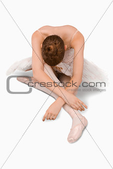 High angle shot of sitting ballerina