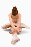 Sitting ballerina doing stretches