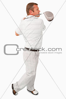 Side view of golfer