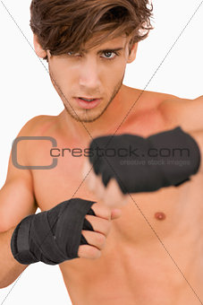 Male martial arts fighter in fighting pose