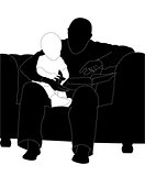 man and child read the book (silhouette)