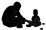 man and child playing (silhouette)