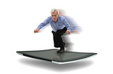 Senior businessman surfing on a PC tablet