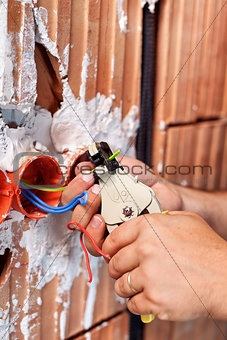 Electrician hands at work