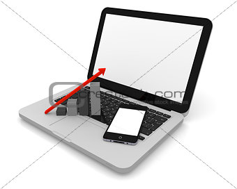 Laptop with smartphone and growth chart