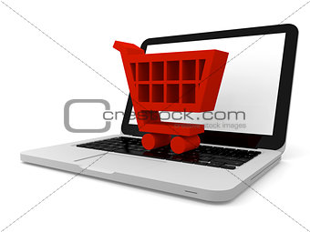 Shopping trolley symbol on laptop