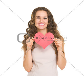 Happy young woman showing valentine's day cards