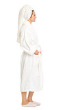 Full length portrait of young woman in bathrobe looking on copy 