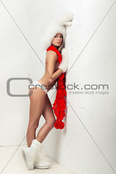 Fashion portrait of young beautiful woman posing on white backgr