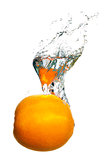 Orange splashing in the water
