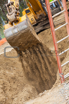 Excavator Tractor Digging A Trench