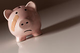 Piggy Bank with Bandage on Face