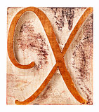 ornamental letter X in wood type