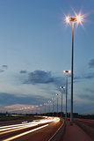 Road lighting, lighting columns, night highway.