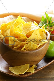 corn tortilla chips in a wooden bowl