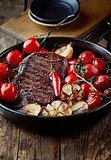 Grilled beef steak with rustic vegetables