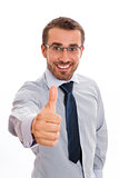 Smiling businessman and thumb up sign
