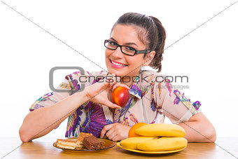 Woman, fruits and cakes.