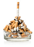 Cigarettes in a glass ashtray
