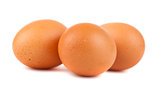 Three brown chicken eggs