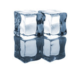 Pair of blue ice cubes with reflection