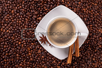 High angle view of a coffee cup with cinnamon 