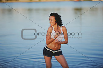 Young Woman next to water  