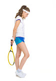 Full length portrait of female tennis player