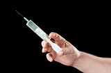 Large Syringe in hand
