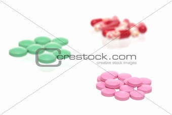 Many different tablets on a white background