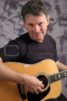 Stock Photo of Mature Male Guitarist 5