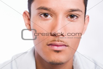 Neutral looking Indonesian young man