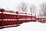 red fence in snow day