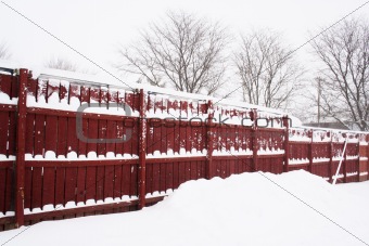 red fence in snow day
