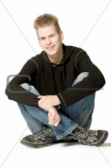 Boy in a black sweater smiling