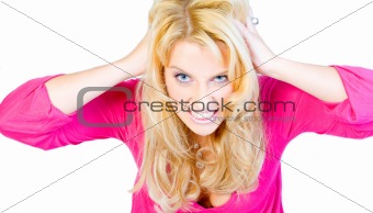 Studio portrait of a hysterical long blond girl 