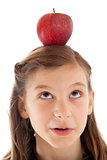Girl with an apple on her head