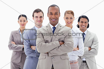 Close-up of a business team smiling and crossing their arms