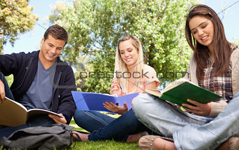 Low angle-shot of young people studying