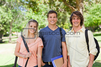Portrait of Three students side by side 
