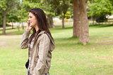 Side view of a teenager phoning