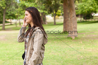 Side view of a teenager phoning