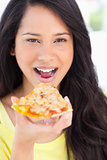 Close up  of a woman about to eat pizza