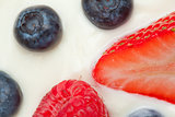 Slice berries on the cream