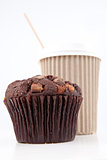 Chocolate muffin and a cup of coffee placed together
