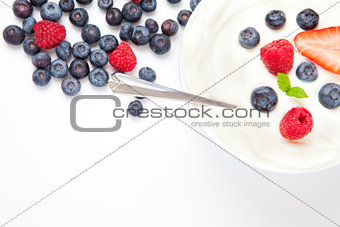 Dessert of berries with cream