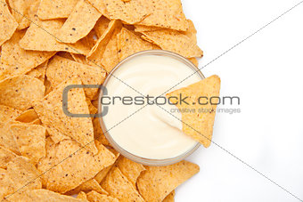 Bowl of dip surrounded by chips