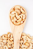 Wooden spoon with cashew nuts