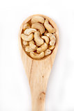 Wooden spoon with cashew nuts