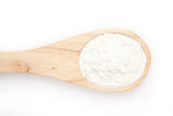 Wooden spoon with flour